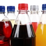 Soda in plastic bottles isolated on a white background